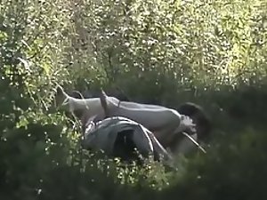 Horny guy fucks her like a rabbit in the grass