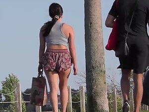 Hard nipples and accidental nudity of asian girl in park
