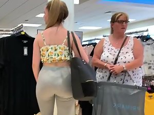 Sexy daughter shopping around with fat mother