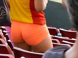 Tight little ass in orange shorts Picture 1