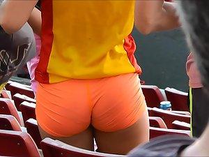 Tight little ass in orange shorts Picture 2