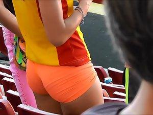 Tight little ass in orange shorts Picture 4