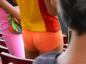 Tight little ass in orange shorts Picture 7