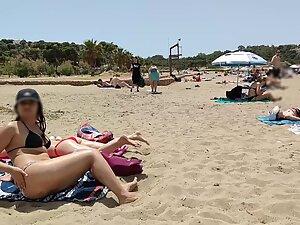 Hot pale girl suntanning on her first beach day Picture 4