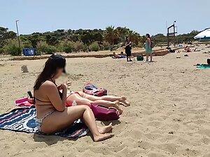 Hot pale girl suntanning on her first beach day Picture 5