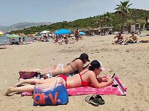 Hot pale girl suntanning on her first beach day Picture 8