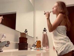 Spying on fit girl getting dressed in bathroom Picture 2