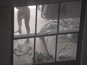 Peeping on naked neighbor interacting with her cat Picture 8