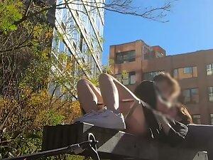 Upskirt while she lays on boyfriend's lap Picture 3