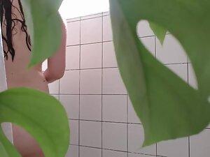 Spying a busty girl shower and masturbate with water Picture 1