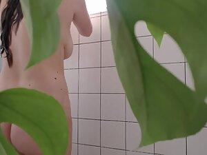 Spying a busty girl shower and masturbate with water Picture 6