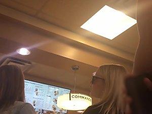 Hot blonde in all black outfit waits for her coffee Picture 7