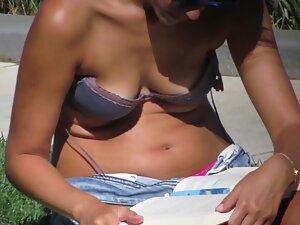 Sweet tits slipping out of a bra in the park - Voyeur Videos