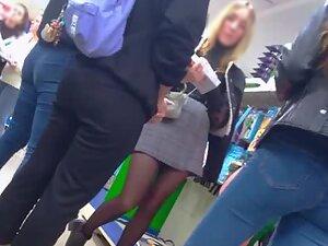 Upskirt of a blonde that looks like a sexy secretary