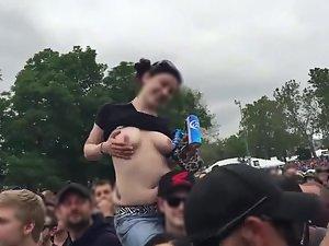 Tits flashing in a concert crowd Picture 4