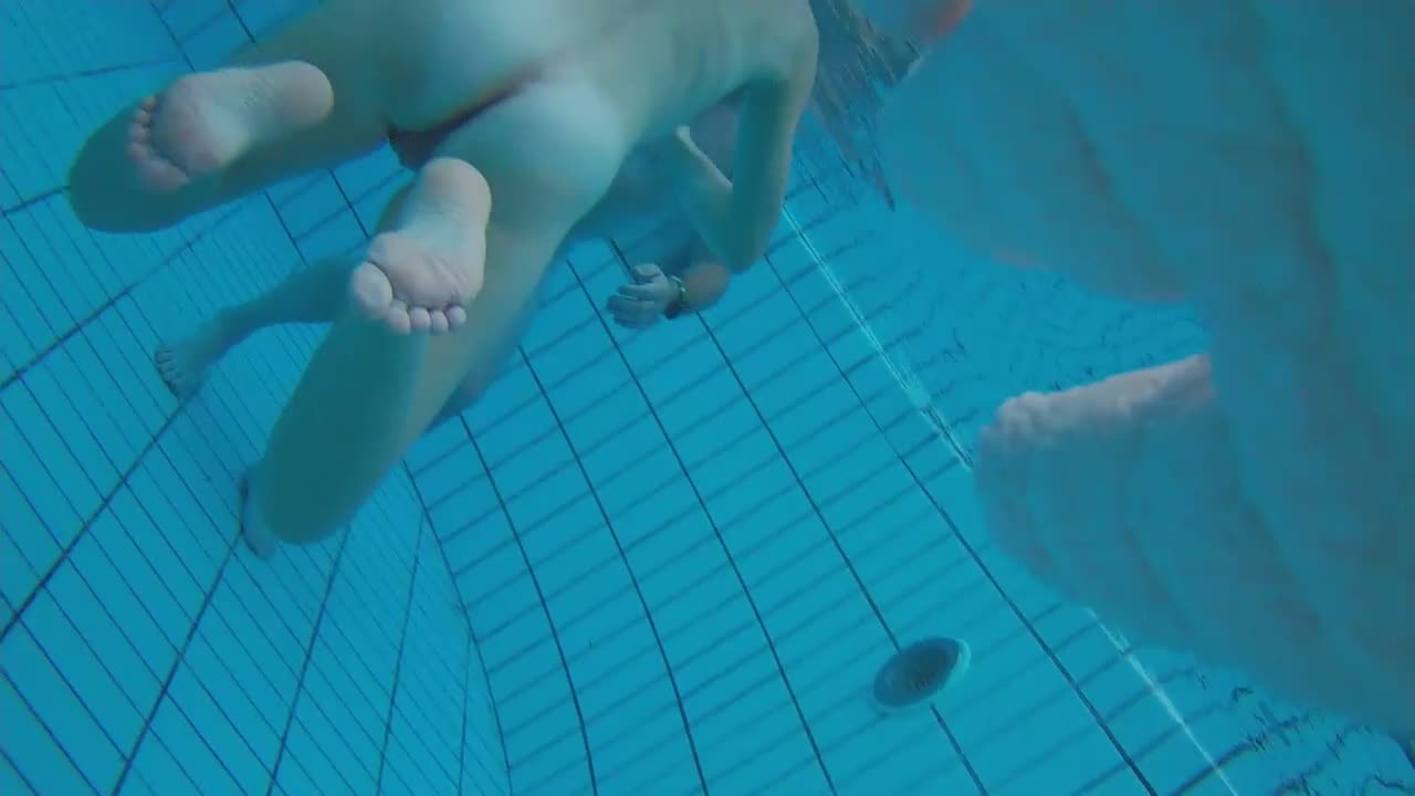 Underwater scenes of the nude chicks in the sauna pool