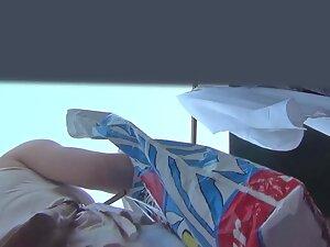 Upskirt of hot blonde at the flea market Picture 5