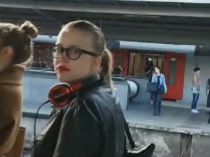 Girl with red lipstick notices the voyeur