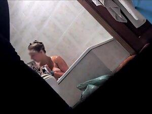 Spying her shave pussy while roommate is in bathroom Picture 1