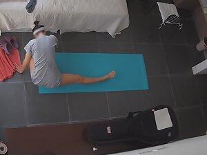 Spying on half naked milf doing yoga at home Picture 2