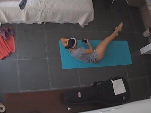 Spying on half naked milf doing yoga at home Picture 4