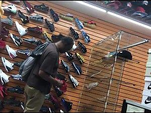 Black girl's hard nipples are visible in shoe store Picture 3