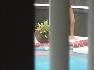 Naked neighbor girl is peeped on at the pool Picture 5