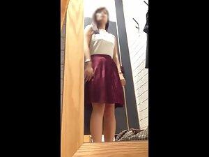 Cute asian girl spied while trying new blouses Picture 4