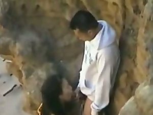 Peeping a relaxing blowjob by the cliffs