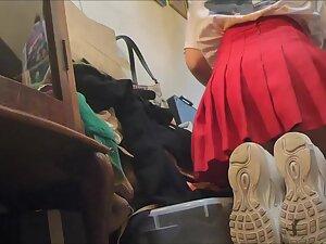 Upskirt of store clerk while she kneels down Picture 3
