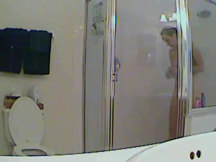 Peeping on sister in law under a shower image